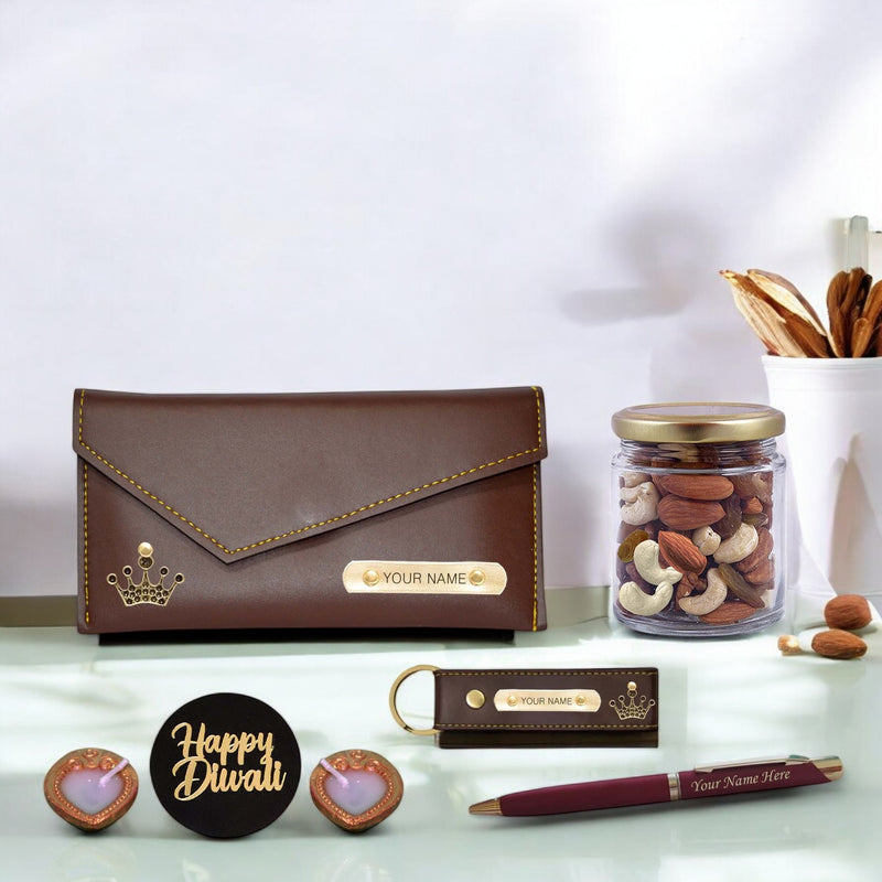 Diwali Gift Set for Female– Clutch, Pen, Keychain With Dry Fruits & Diyas.