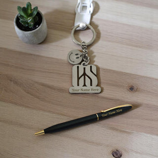 Personalized CS Set: Engraved Smiley Keychain & Black-Gold Pen.