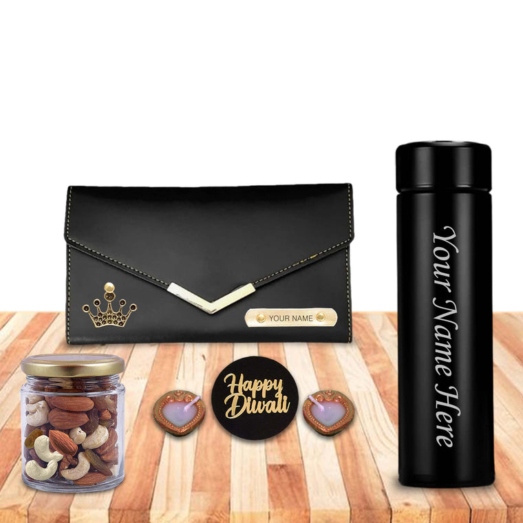 Diwali Gift Set for Women – Bottle with Name, Clutch With Dry Fruits & Diyas.