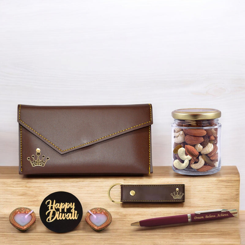 Diwali Gift Set for Women – Leather Clutch with Queen Charm, Engraved Pen & Keychain.