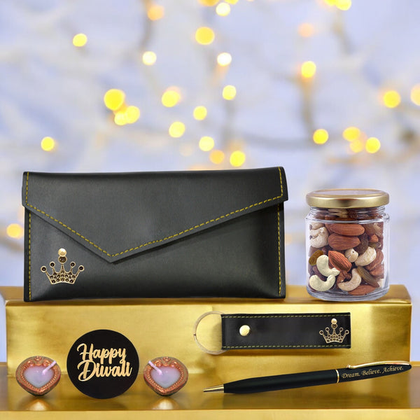 Diwali Gift Set for Women – Leather Clutch with Queen Charm, Engraved Pen & Keychain.