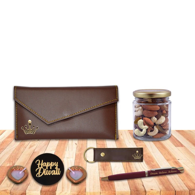 Diwali Gift Set for Women – Leather Clutch with Queen Charm, Engraved Pen & Keychain.