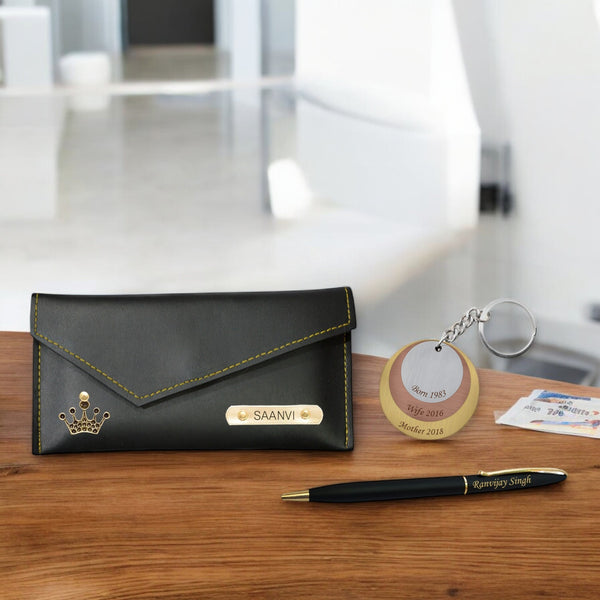 Personalized Anniversary Combo: Trinity Keychain, Engraved Pen & Personalized Clutch.