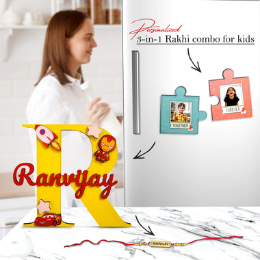 Rakhi Gift Combo –Colored Name Monogram, Puzzle Magnet & Foil Rakhi.